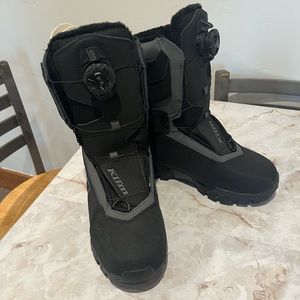 Women klim snowmobiling boots. Never worn. Size 7.